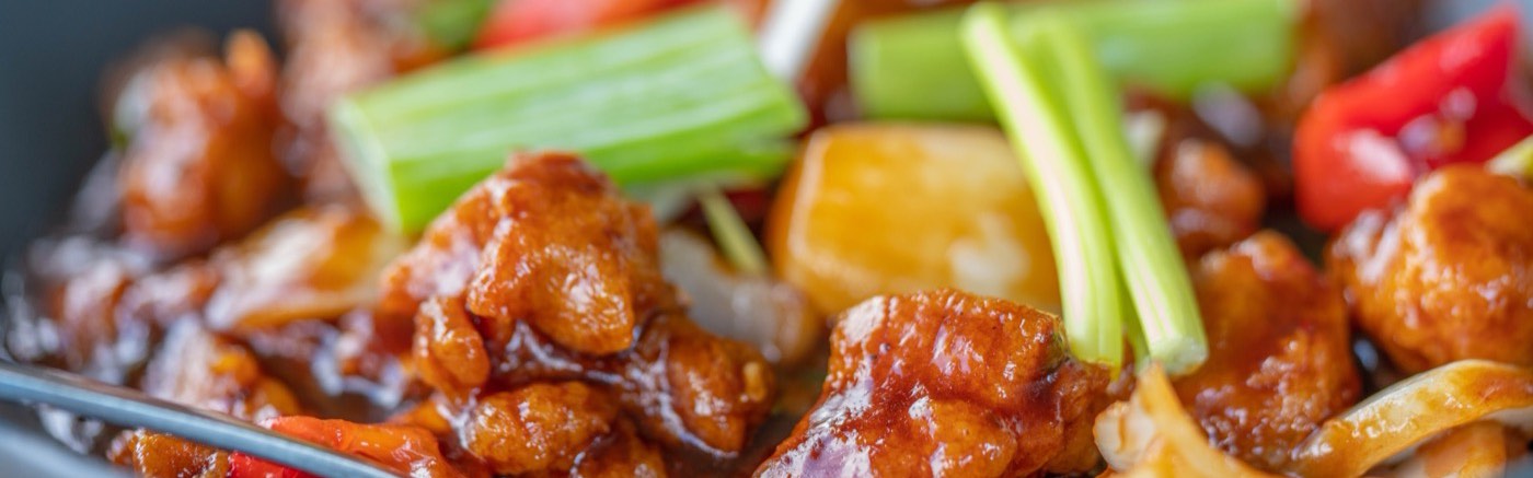 Chili Chicken mit Paprika und Zwiebeln